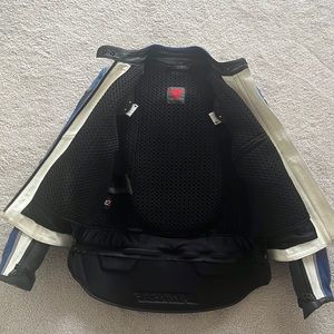 Dainese motorcycle jacket w armor and detachable tailbone guard. Size 42